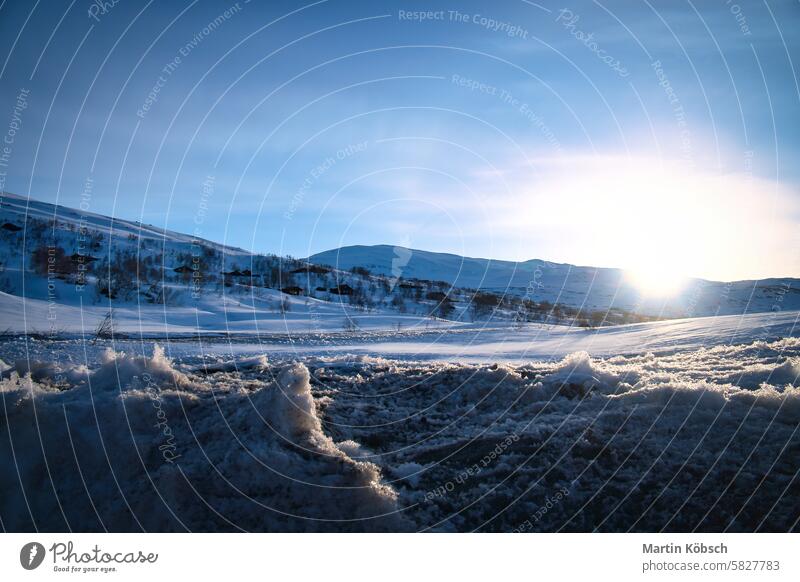 Ice crystals in a snow-covered landscape in the high mountains of Norway Winter winter landscape ice cold tree frost white magic road light lantern motif path