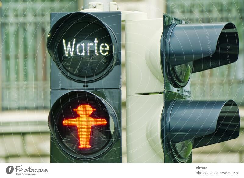 exciting I Pedestrian traffic light is red with the addition - Wait - / red traffic light man Traffic light ampelmännchen wait Red StVO Road sign red phase