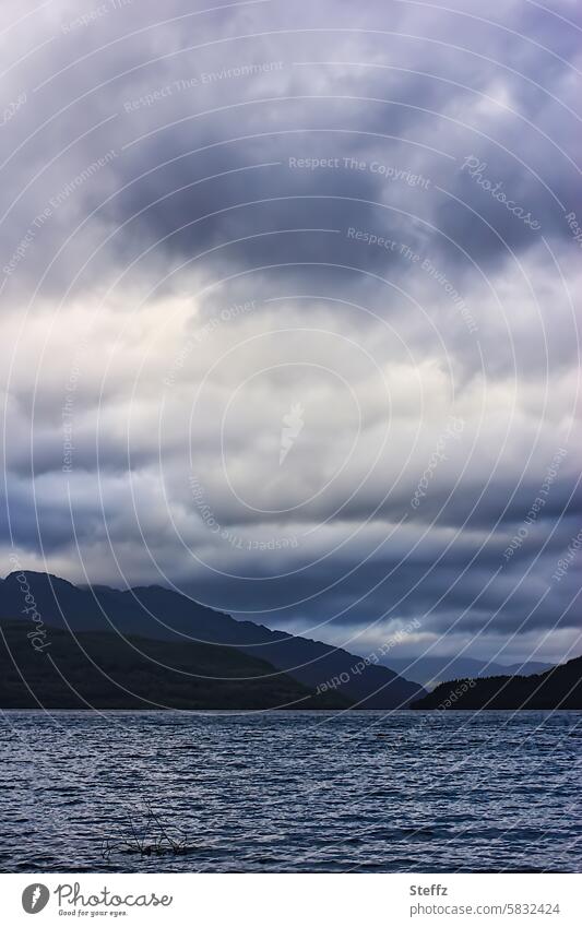 Scottish seascape under a cloudy sky water landscape Scotland fjord seaboard Clouds romantic Scottish nature Romance Water Calm tranquillity Scottish weather