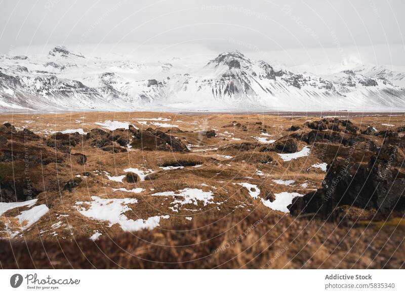 Winter landscape in Snaefellsnes Peninsula, Iceland winter iceland snaefellsnes peninsula mountain snow cloud sky rugged terrain outdoor nature scenic cold