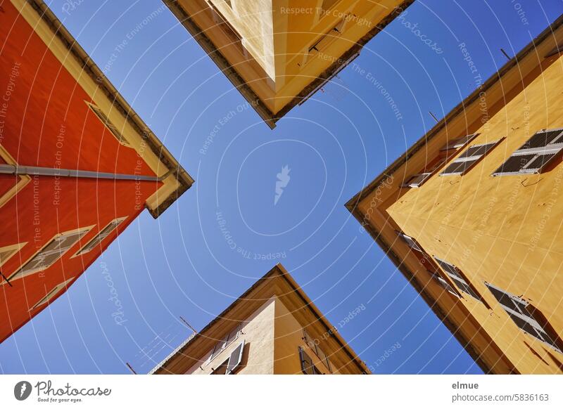 exciting I Frog's-eye view of four Mediterranean-style houses seen from an intersection dwell Bastia cross Mediterranean sea Corsica Apartment Building Summer