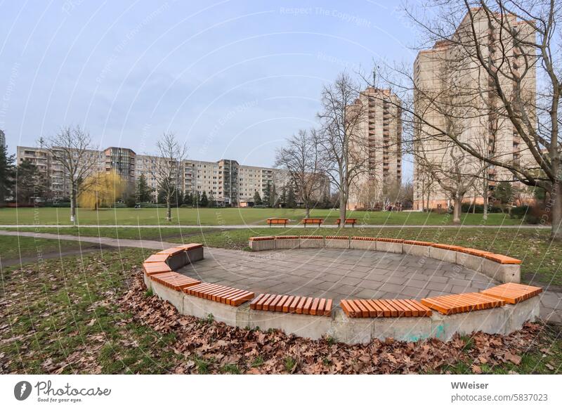 Benches arranged in a circle, neighborhood meeting point in the middle of social housing Rental house Social dwell Flat (apartment)