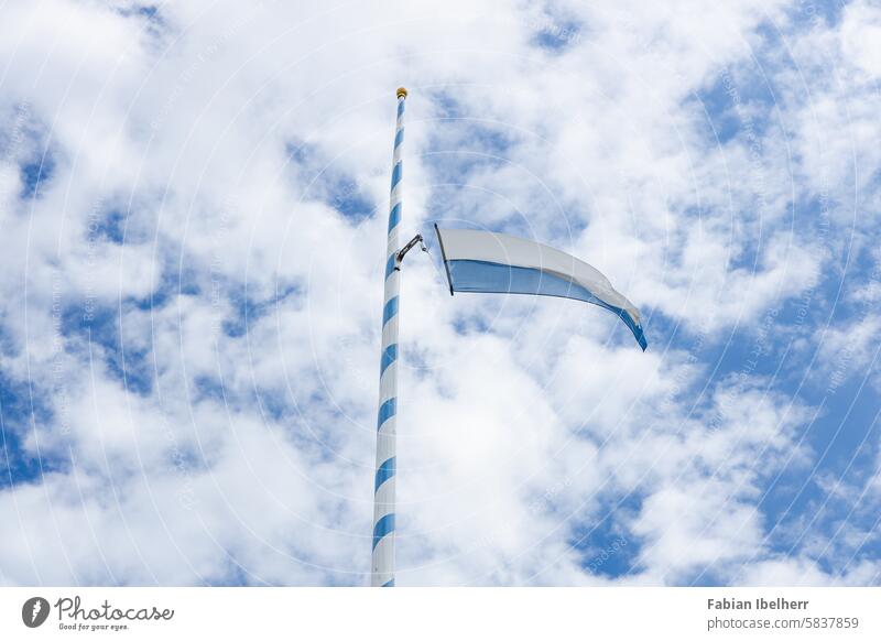 Maypole in Upper Bavaria May tree Bavarian flag May Day celebrations Flagpole Public Holiday Tradition customs maitanz Germany