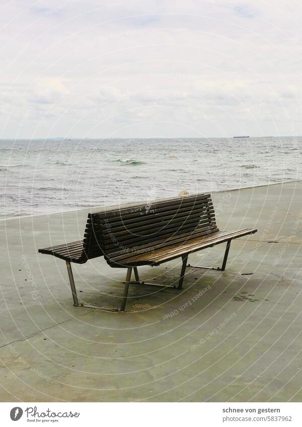 Alone by the water Water Ocean Deserted Bench tranquillity Nature Relaxation Landscape Exterior shot Sky Calm Blue coast Idyll Lake Peaceful Surface of water