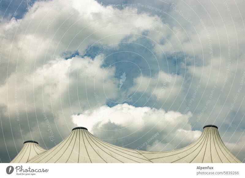 Tent roof and clouds Clouds Circus tent Sky Event Clouds in the sky Wind Tarpaulin Culture Point Roof Shows Bad weather Gale Feasts & Celebrations Concert