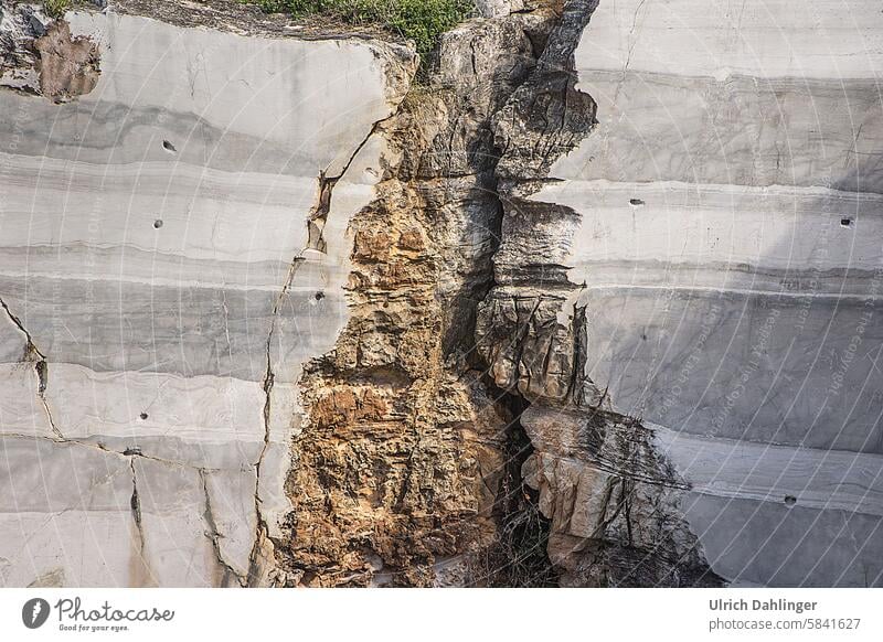 Marble structure in natural surroundings, interrupted in the middle stone Pattern Surface Stone Quarry Gray Material Rock detail Nature texture Wall (building)