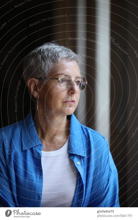 UT Leipzig - cheerful to cloudy | Portrait of a melancholy woman at the window, memory, melancholy portrait Woman Half-profile Upper body Front view Forward