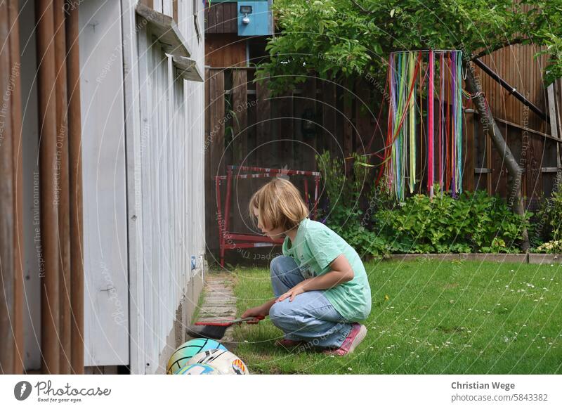 Girl with hand brush at garden work sweep Garden Gardening Nature Puzzles Work and employment Leisure and hobbies Green Exterior shot Gardener Plant Grass Lawn