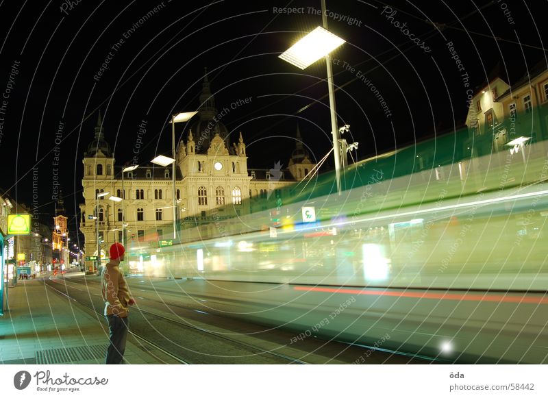 rush hour #2 Long exposure Light Tram Driving Railroad tracks Main square Graz Night Man Historic Movement Lighting Lamp stand buildings Station Wait