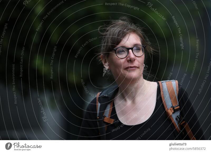 UT Leipzig - cheerful to cloudy | Young woman traveling with a backpack portrait Woman Brunette Eyeglasses Backpack on the move City trip Adults Exterior shot