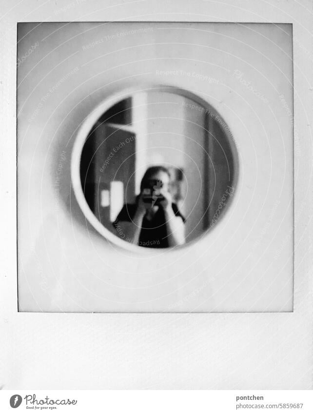 black and white polaroid. mirror selfie with camera Woman Polaroid Selfie black-white Mirror Round Self-Love portrait Mirror image Interior shot room vintage