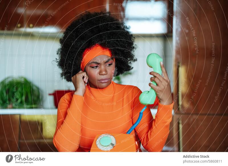 Confused woman in 50s attire holding retro telephone black perplexed 1950s fashion vibrant green vintage confusion style looking away home indoor colorful