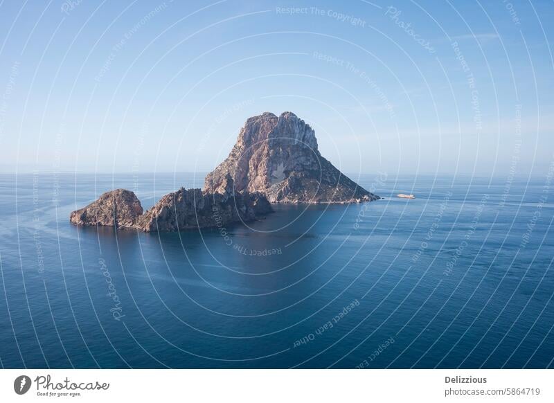 magical and legendary rock of Es Vedrà, Ibiza, Spain travel sea island wave sky sunset panorama landscape ibiza mountain ocean blue coast vacation spain