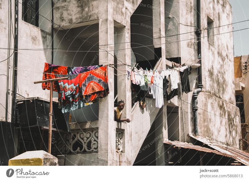 Drying laundry in the sunshine Laundry Washing day Photos of everyday life Housekeeping Mombasa Kenya Africa clothesline Town house (City: Block of flats)