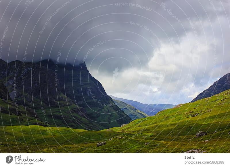 heavy storm clouds over a hill and the Scottish valley Valley Hill Clouds in the sky Storm clouds Thunder and lightning dramatic clouds Scottish nature Scotland