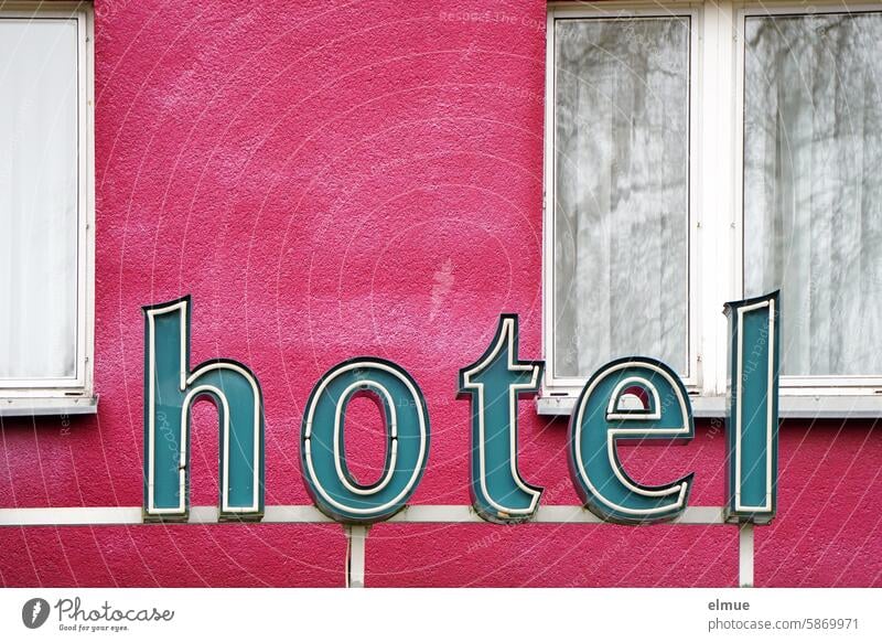 Illuminated sign - hotel - in front of the pink building with windows Hotel Neon sign spend the night Hotel room Window Vacation & Travel Tourism overnight