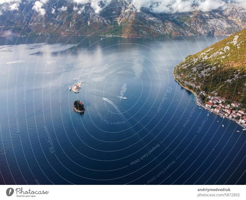 Aerial view of Our Lady of the Rocks or Gospa od Skrpjela and Catholic monastery Saint George in the bay of Kotor, in city of Perast, Adriatic sea, Montenegro. Tourism destination