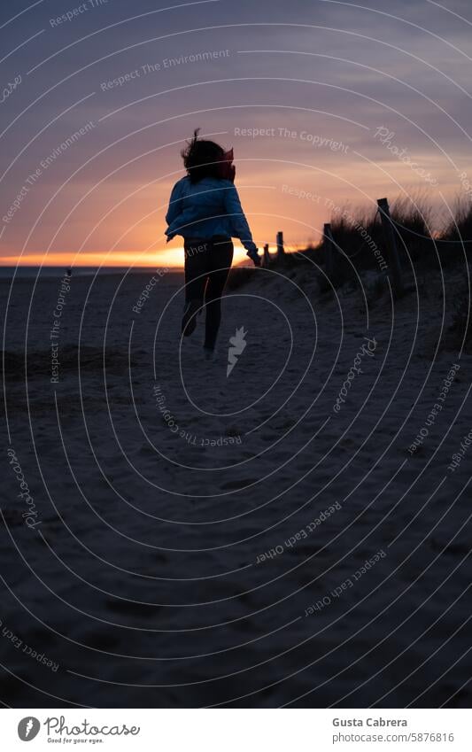 Woman runs through the sand of the Mediterranean Sea at sunset. Sand Sandy beach Mediterranean sea Sunset Vacation & Travel Tourism Beach Relaxation Landscape