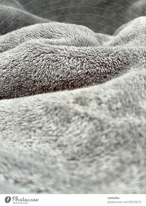 Wool blanket, wave shape, fluffy, text free space Warmth Copy Space Deserted Detail Close-up Blanket Homey Cuddly Soft Plush Shallow depth of field Contrast