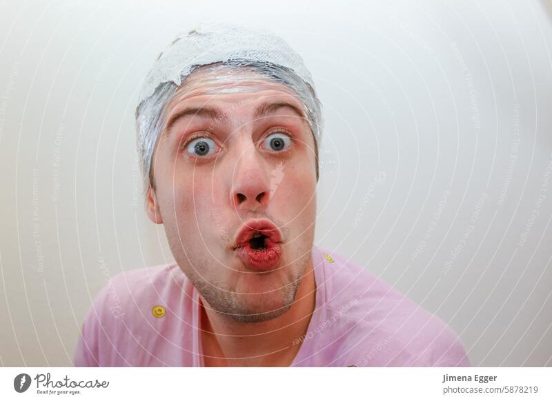 young man with plaster mask on his head Man Plaster cast portrait Human being Face of a man Head Grimace Looking into the camera Amazed look in astonishment