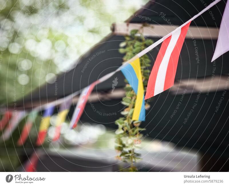 Garland with flags Flags international National flags Flag decoration Blow Patriotism Judder UEFA European Championship World Cup Party celebrations EM