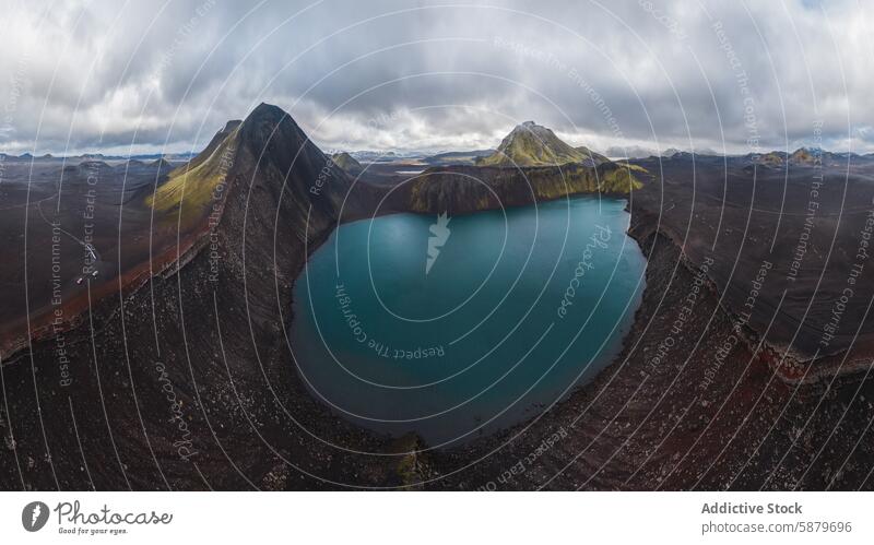 Majestic highlands landscape with crater lake in Iceland iceland mountains drone panoramic view rugged clouds sky volcanic terrain drone view nature scenic