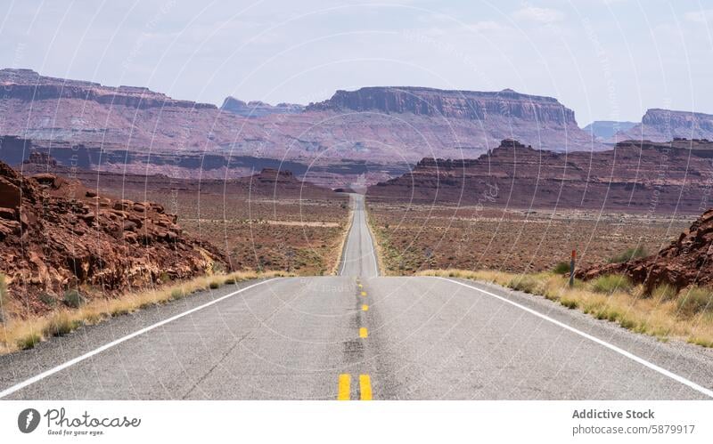 Open Road in Utah desert road highway white canyon glen canyon national recreation area usa utah landscape rugged expanse barren remote travel scenic vast