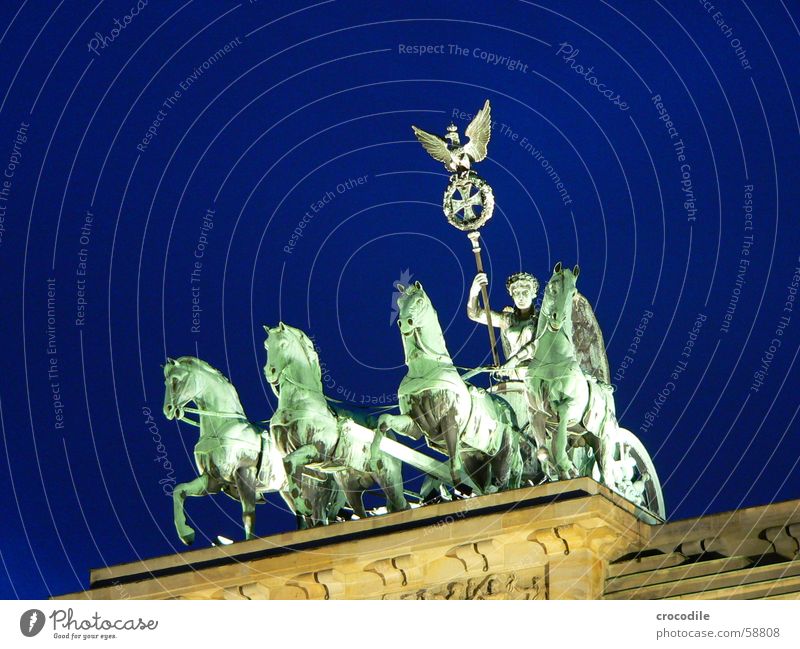 ride into the blue Pariser Platz Night Green Pedestal Eagle Bird Symbols and metaphors Landmark Monument Berlin branderburgertor Blue Lighting Lamp Human being