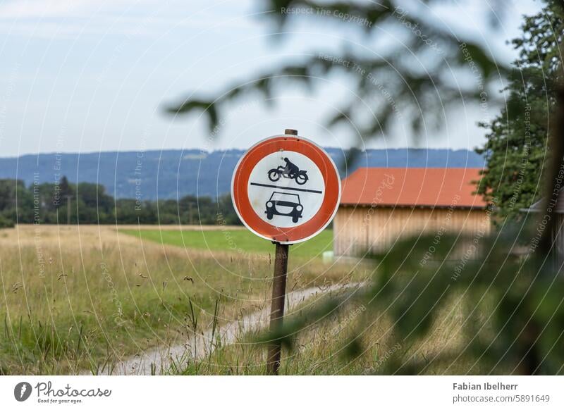 Traffic sign indicates no through traffic on dirt road Transit prohibited Prohibition sign No through road Road sign off the beaten track Bavaria Germany