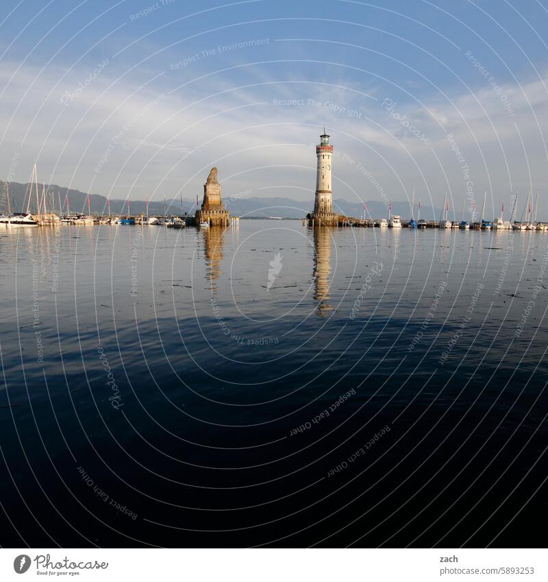 Keep exit clear Lake Constance Lindau bodensee region Sky Historic Blue Water Landscape Harbour Mole Clouds Lighthouse Pier Evening Dusk