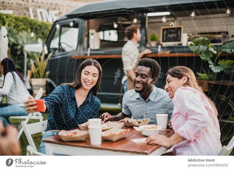 Multiracial people having fun doing selfie at food truck outdoor - Focus on african man face away bar beverage camera cellphone client community customer dinner