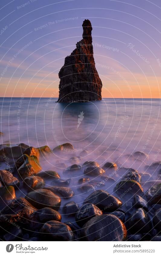 Iconic rock formation against sunset in Madeira, Portugal madeira portugal coast sea seascape water stone nature landscape travel scenic outdoor atlantic