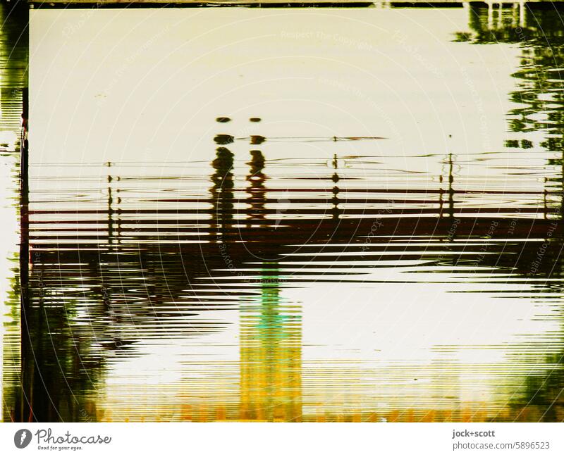 Silhouette of people enjoying nature and culture Human being Water Reflection carp pond Abstract Surface of water Structures and shapes Water reflection Nature