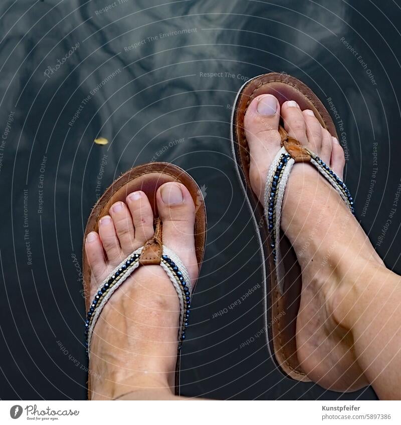 Let your bare flip-flop feet dangle over the water. Summer Summery warm Warmth Water urban Relaxation free time relax relaxation refreshingly recover To enjoy