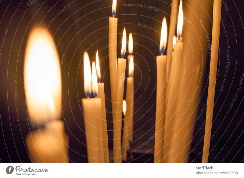 Many lighted candles in a church shoulder stand Candlelight Candle flame Warm light Warm colour Church Light Flame Illuminate Burn Pensive Hope Meditation