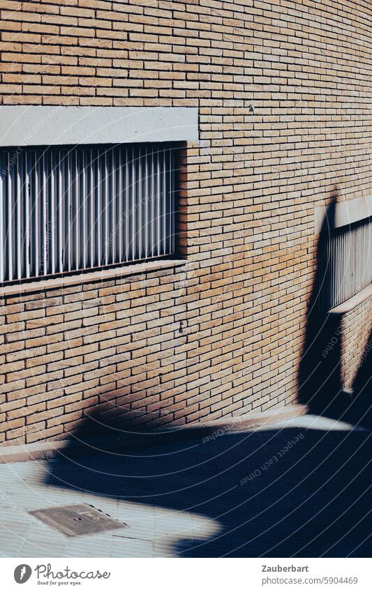 Shadow cast on brick wall with closed window in upward swing Swing Upward Abstract Gloomy pretty