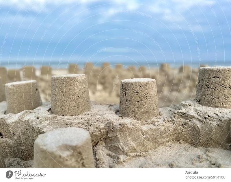 Lots of sand towers on the beach Sand castle Sandcastle Beach Child Playing Build Bucket vacation Ocean Summer Infancy Summer vacation coast Sandy beach