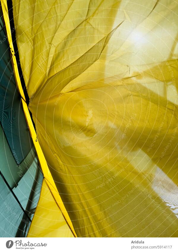 Sunlight shines through the yellow tent Tent Cloth crease Light Structures and shapes Folds Detail Textiles Wrinkles Screening Interior shot camping Lie rest