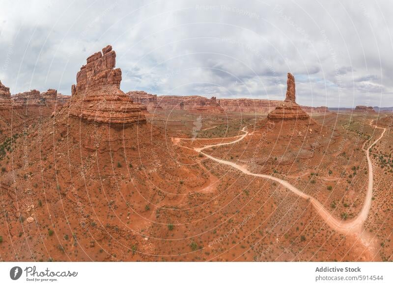 Aerial view of Utah's Valley of the Gods utah valley of the gods aerial landscape sandstone formation road winding dirt tower majestic scenic outdoors nature