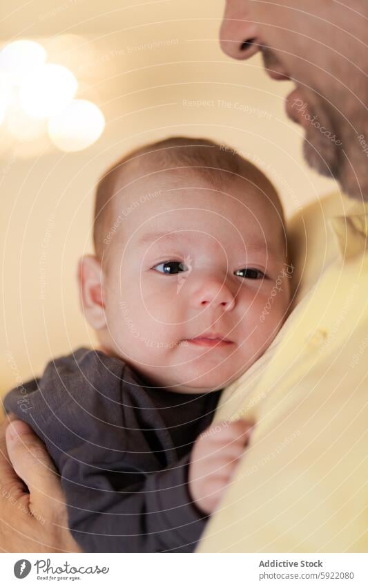 Cute baby in hands of crop anonymous father cry man upset childcare embrace love tender childhood newborn affection parent adorable together gentle infant