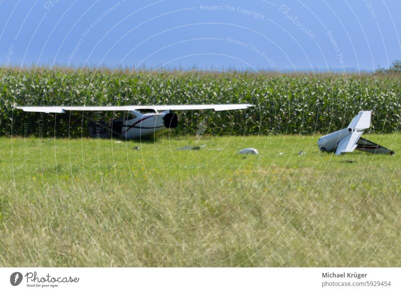 Airplane wreck on a meadow, plane crash Accident Aircraft Aviation Countryside Crash site Damage. Debris Disaster Emergency Emergency response Engine Field Fire