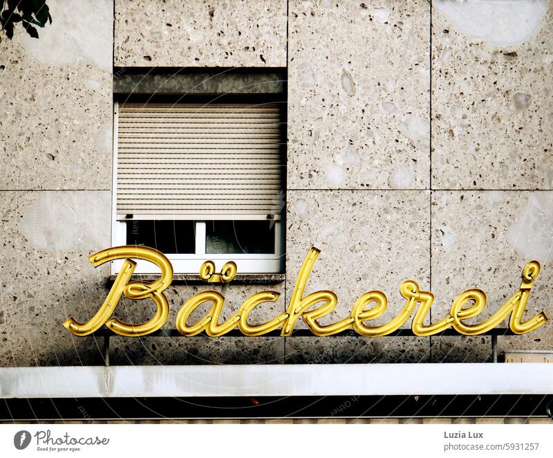 Bakery, lettering in front of an old facade with window Eye-catcher embassy Old Yellow Illuminated letter Letters (alphabet) Characters Text writing Word