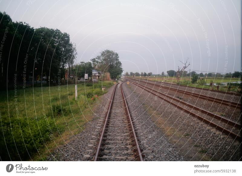 railway crossing the countryside transportation travel no people steel track road journey outdoors traffic railroad rail transportation railroad track direction