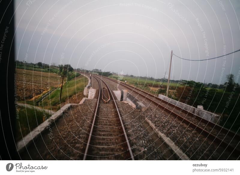 railway crossing the countryside transportation travel no people steel track road journey outdoors traffic railroad rail transportation railroad track direction