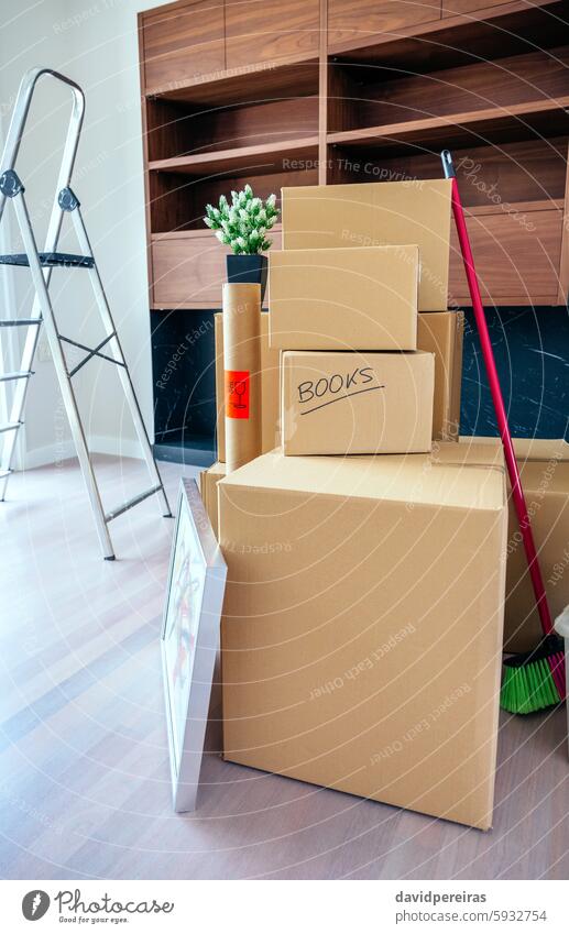 Living room with moving boxes brand new packing home move relocation stack pile house living prepare place apartment property flat interior cardboard concept