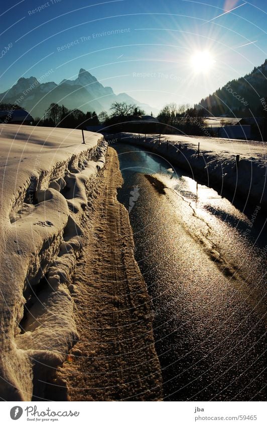 Mine road #3 Electricity pylon Tree Flashy White Yellow Tar Wet Saanenland Sunset Beautiful Moody Mount Gummfluh Sky Mountain Snow Street Blue Water