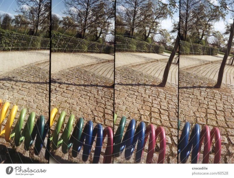 lomokringel Multicoloured Tree Fence Clouds Green Lomography supersampler Street Sky Blue Shadow