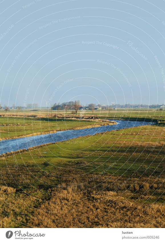 Dike landscape | view of East Frisian landscape with river Wind energy plant Landscape Air Water Sky Sun Winter Beautiful weather Tree Grass Field coast