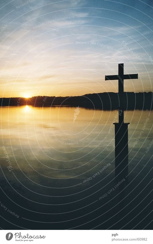 Cross of King Ludwig at Lake Starnberg Sunset Moody Water Back Sky Blue