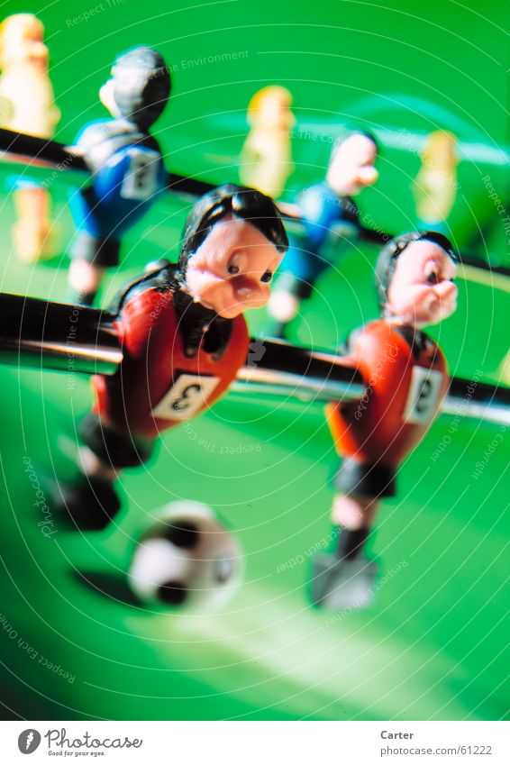 fully pull through Jersey Table soccer Green Action Man Sports team Ball ball feeling Lighting Joy Shallow depth of field Snapshot Motion blur Movement